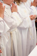 children accepting the first Holy Communion