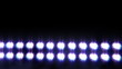 Spotlights on the black background.