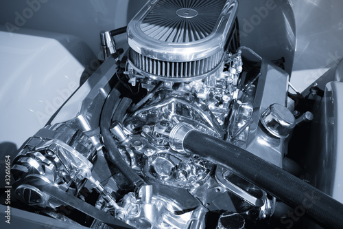 Photo: blue toned powerful chromed auto engine blue toned powerful chromed auto engine