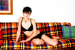 Young woman on sofa