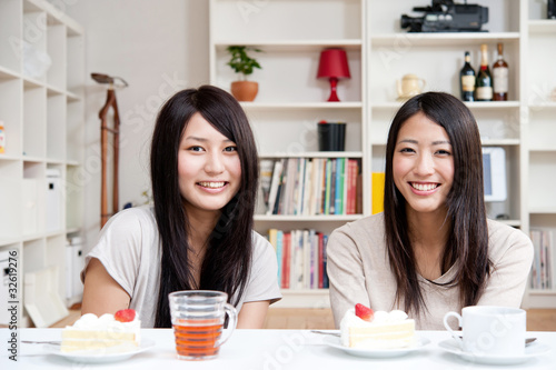 Photo: beautiful asian women relaxing in the room beautiful asian women relaxing in the room