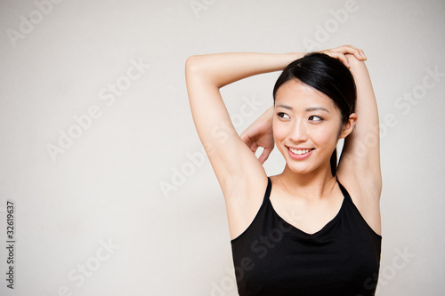 Photo: beautiful asian woman exercising beautiful asian woman exercising