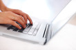 Photo: Female hands on keyboard of laptop - Cropped image Female hands on keyboard of laptop - Cropped image