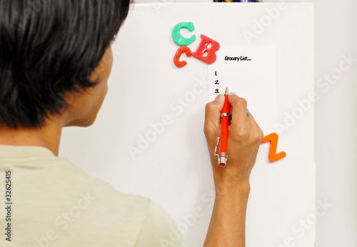 Photo: Setting Up Grocery List on Fridge Setting Up Grocery List on Fridge
