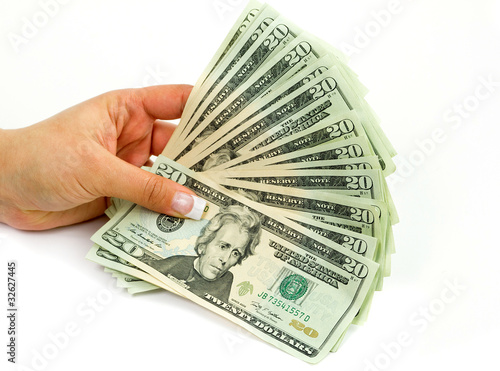 Photo: Female hands holding 20 dollar banknotes Female hands holding 20 dollar banknotes