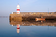 Old Lighouse and Boat with Sea Water Replection Old Lighouse and Boat with Sea Water Replection