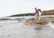 Father and son on beach