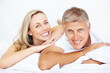 Couple relaxing in bed