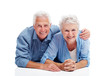 Senior couple lying together on floor