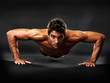 Muscular guy doing pushups Muscular guy doing pushups