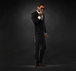 Secret service agent having a conversation on earphones