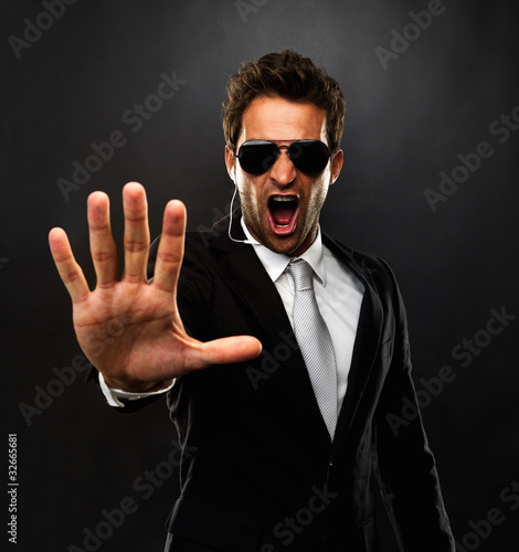 Foto: Secret agent screaming to stop Secret agent screaming to stop