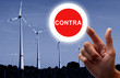 Foto: Hand klickt einen Schalter an - Contra Windkraft Hand klickt einen Schalter an - Contra Windkraft
