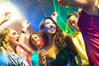 Party people dancing in disco club