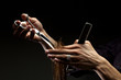 A close-up of hairdresser's hands cutting hair