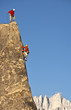 Rock climber rappelling.