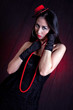 ����: Attractive Asian Woman with Red Necklace, Hat and Black Gloves � johnnydao #32747869