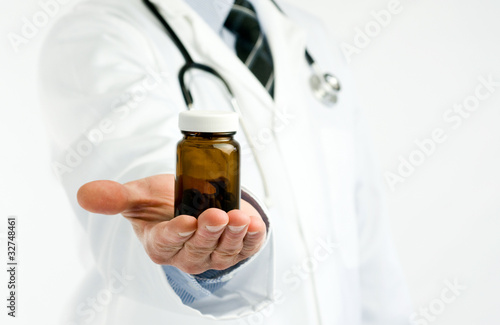 Photo: doctor with pill jar doctor with pill jar
