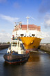 ����: Container ship with tug boat in lock � gigra #32752643