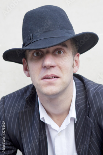 Photo: Portrait of handsom man in hat Portrait of handsom man in hat