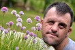 down syndrome man with flower down syndrome man with flower