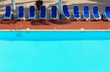 Sun Loungers by a Swimming Pool