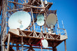 Huge communication antenna tower and satellite dishes