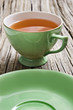 Two antiques cups with tea