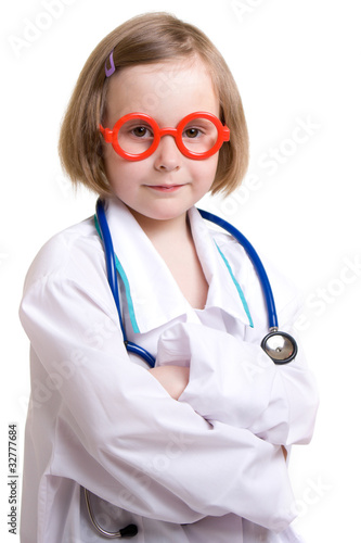 Photo: Little doctor with a white background. Little doctor with a white background.