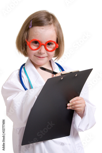 Photo: Little doctor with a white background. Little doctor with a white background.