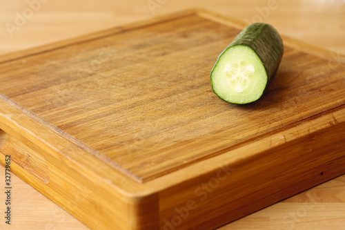 Photo: Cucumber on chopping board Cucumber on chopping board
