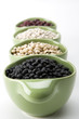 Photo: Assorted mixed dried beans in green ceramic dish Assorted mixed dried beans in green ceramic dish