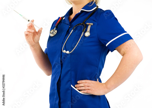 Photo: nurse holding syringe nurse holding syringe