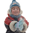 The boy claps his hands and fly snowflakes