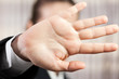 Hand hiding face