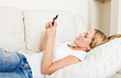 Photo: Young woman messaging with smartphone Young woman messaging with smartphone