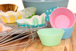 Variety of cupcake liners with wire wisk