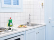 interior Greek island motel apartment kitchen interior Greek island motel apartment kitchen