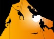 Climbing the rock at sunset