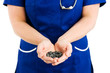 nurse holding pills