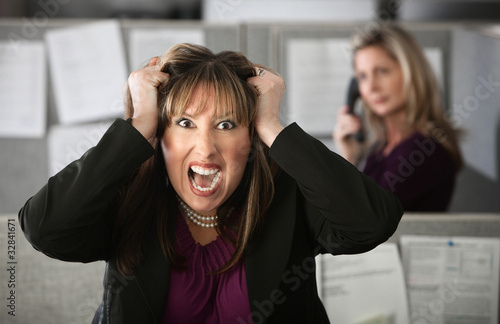 Photo: Frustrated Office Worker Frustrated Office Worker