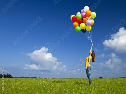 Photo: Girl with colorful balloons Girl with colorful balloons