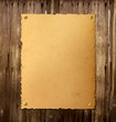 Old vintage poster on wood.