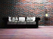 a modern interior with a sofa and a lamp