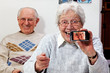senior couple with smartphone