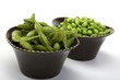 Edamame soy beans in a brown ceramic dish