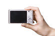 The digital camera in a hand