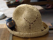 A hat and sunglasses - beach attributes A hat and sunglasses - beach attributes