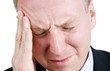 Mid aged man suffering from headache Mid aged man suffering from headache
