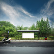 one billboard at bus station with blue sky